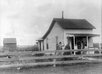 T. W. TOMLINSON Home (Summer of 1900)
Judge Thomas Wiley Tomlinson came to Texas from Tennessee in 1890 and filed on two sections of land 10 miles north of Tulia. He became Vice-President of The First National Bank of Tulia in 1902. In 1910 he became President and held that office until his death. He was County Judge from 1898-1904, and was principal of Tulia Schools in about 1895. He was in the insurance business, church clerk for over 30 years for the Baptist Church, and a Mason. He married Lula Browne in New Mexico, and they were the parents of Anna Garnett, Guy Hugh, Marie Louise, and Edna Brown. In 1895, the family moved to Tulia, where Judge Tomlinson was instrumental in bringing the railroad to Tulia. tomlinson2.jpg